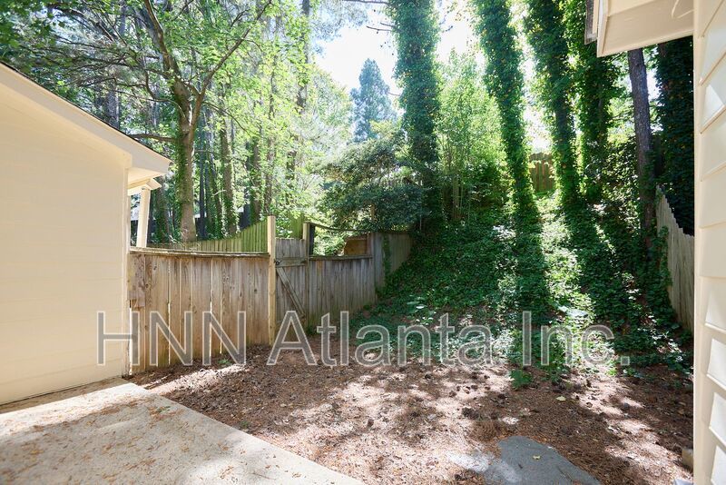 2BR/2.5BA Townhome Gem with Fenced Yard, Fireplace & Bay Windows property image