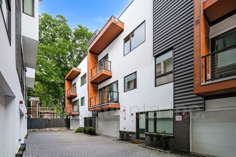 Sleek 2BR Townhome-Style Condo with Rooftop Deck property image