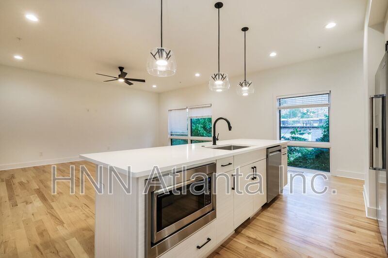 Sleek 2BR Townhome-Style Condo with Rooftop Deck property image
