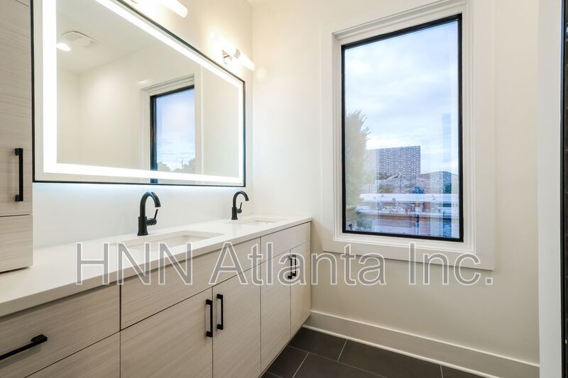 Sleek 2BR Townhome-Style Condo with Rooftop Deck property image