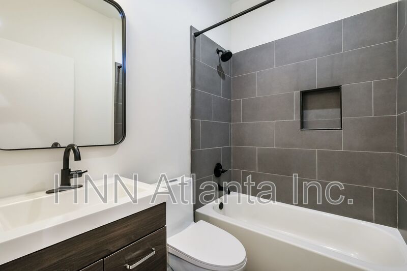 Sleek 2BR Townhome-Style Condo with Rooftop Deck property image