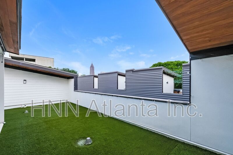 Sleek 2BR Townhome-Style Condo with Rooftop Deck property image
