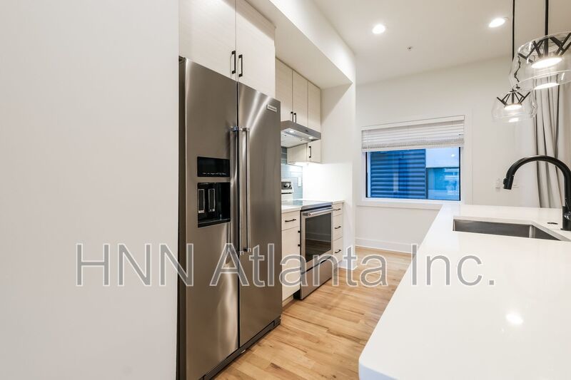 Sleek 2BR Townhome-Style Condo with Rooftop Deck property image